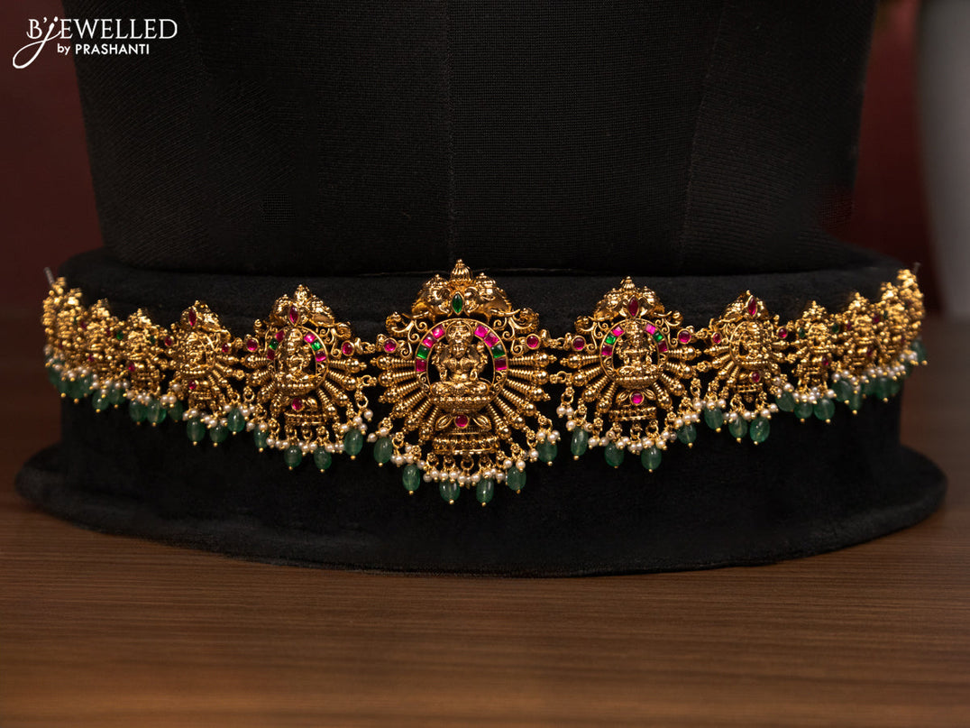 Antique bridal set lakshmi design with jadau stones and green beads hanging