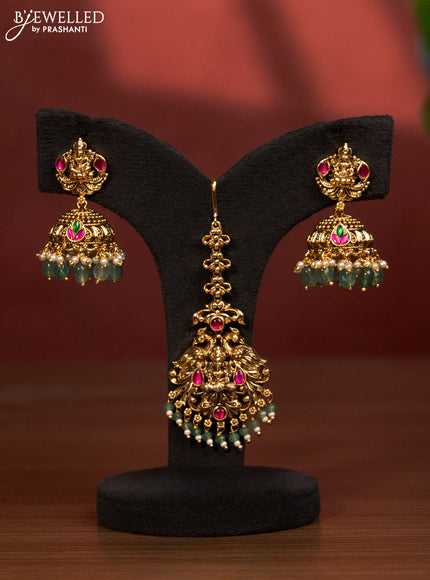 Antique bridal set lakshmi design with jadau stones and green beads hanging