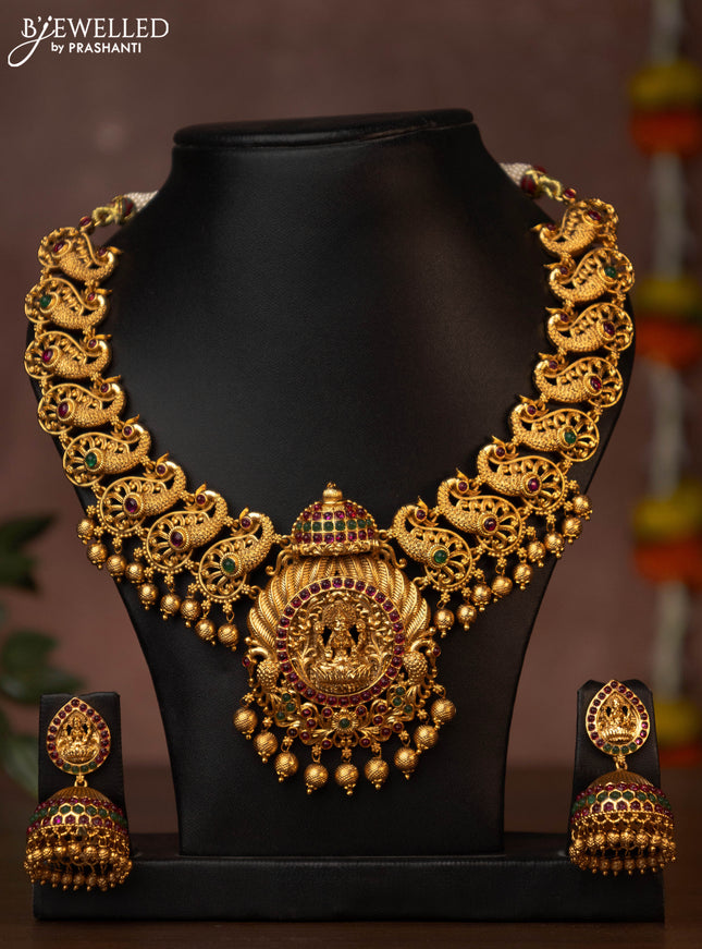 Antique necklace lakshmi design with jadau stones and golden beads hanging