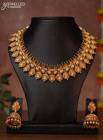 Antique necklace with lakshmi kasu design and jadau stones