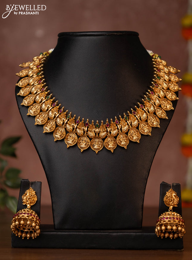 Antique necklace with lakshmi kasu design and jadau stones