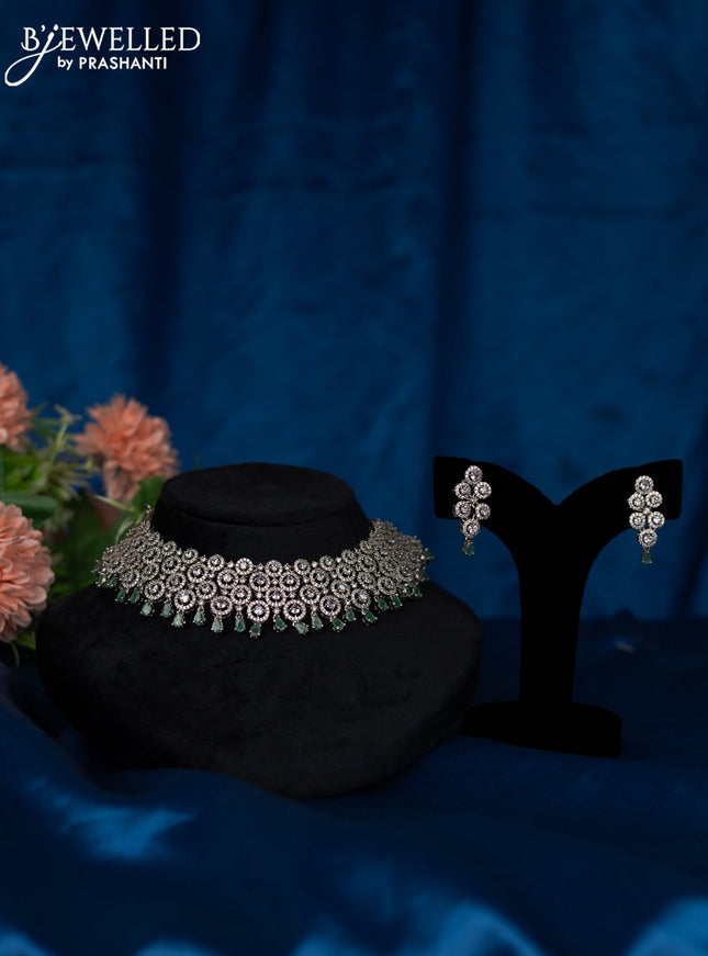 Zircon choker with emerald and cz stones