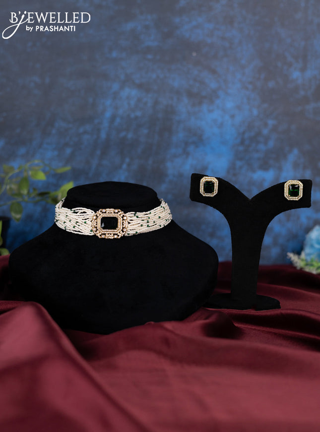 Pearl choker with emerald and cz stones