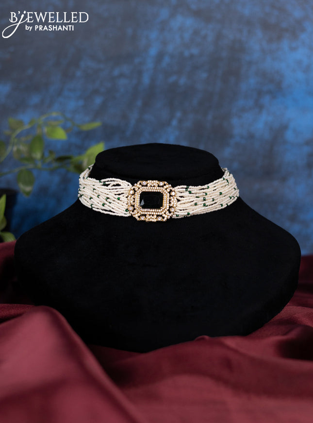 Pearl choker with emerald and cz stones