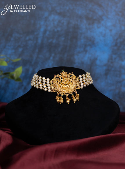 Pearl choker ganesha design with kemp stone and golden beads hanging