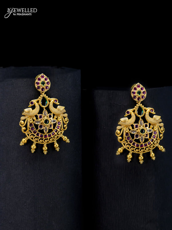 Antique earrings peacock design with kemp stone