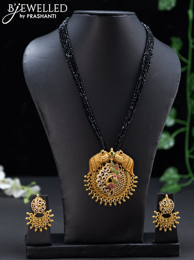 Crystal beaded black necklace with antique kemp and cz stone peacock pendant