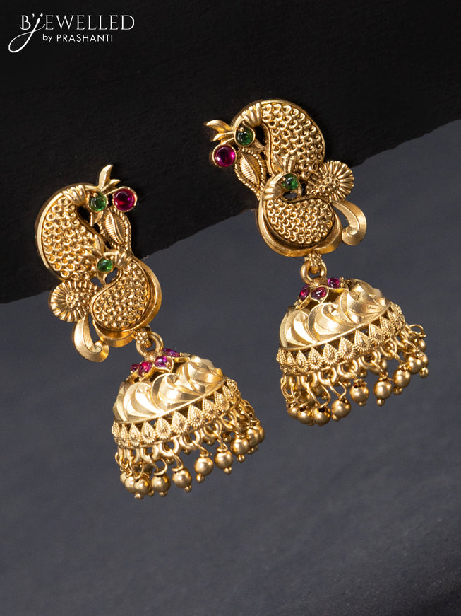 Antique jhumka preacock design with kemp stones and golden beads hangings
