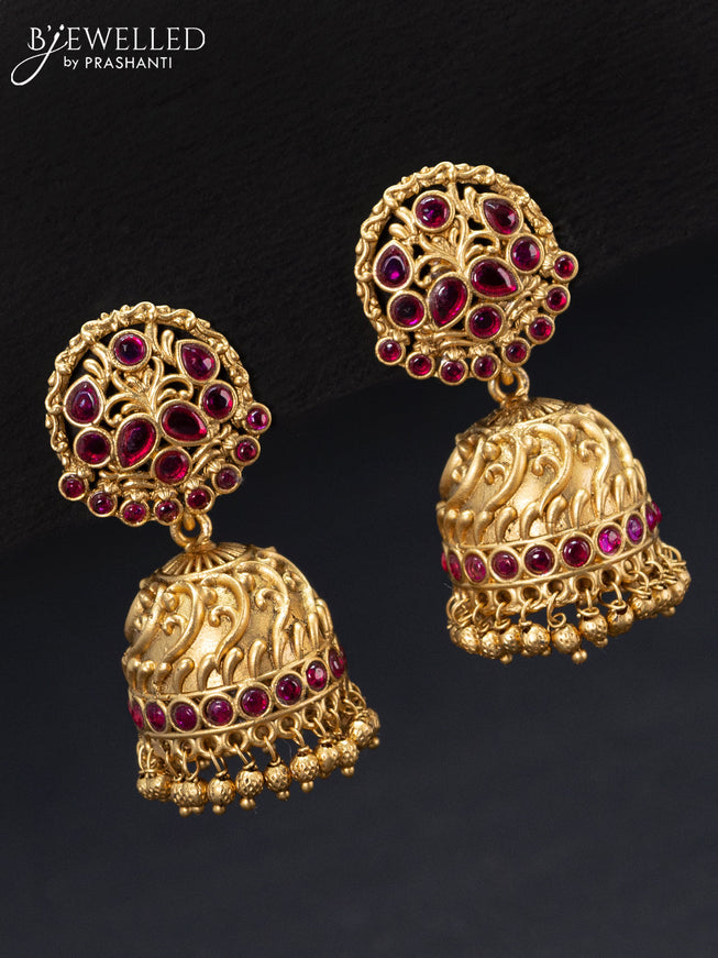 Antique jhumka with pink kemp stones and golden beads hangings