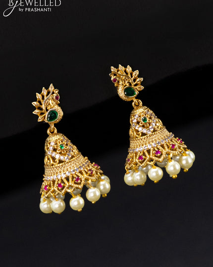 Antique jhumka peacock design with kemp stones and pearl hangings