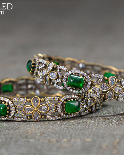 Victorian bangles floral design with emerald and cz stones