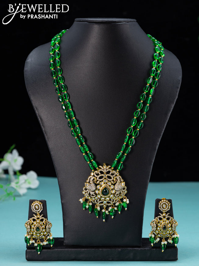 Beaded green necklace peacock design with emerald & cz stones and beades hanging in victorian finish
