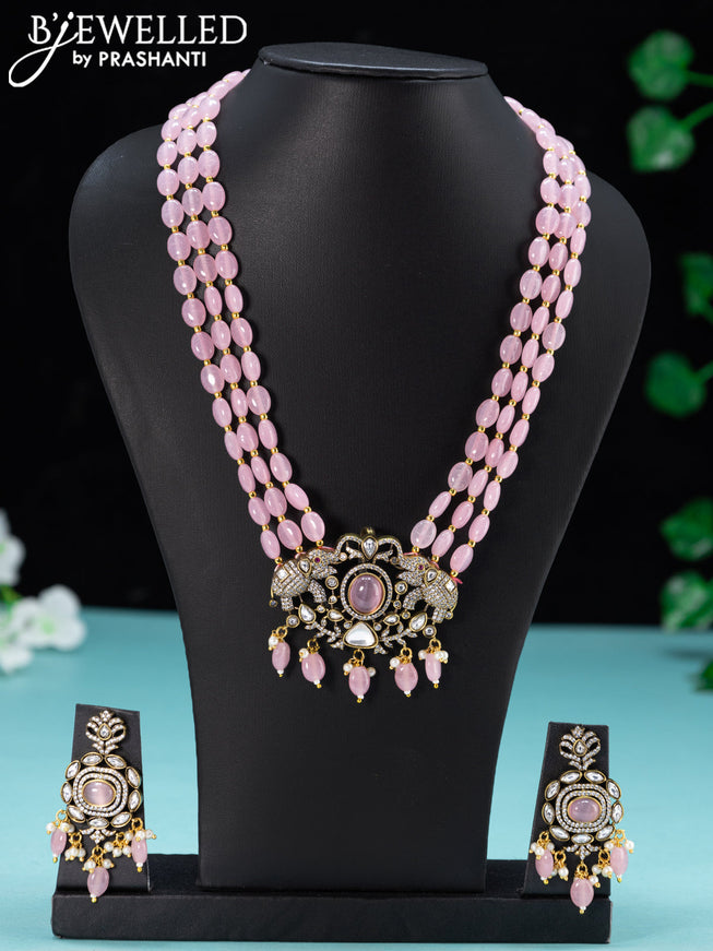 Beaded triple layer baby pink necklace elephant design with cz stones and beades hanging in victorian finish