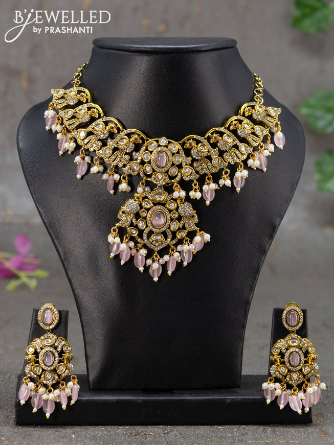 Necklace peacock design with baby pink & cz stones and beads hanging in victorian finish
