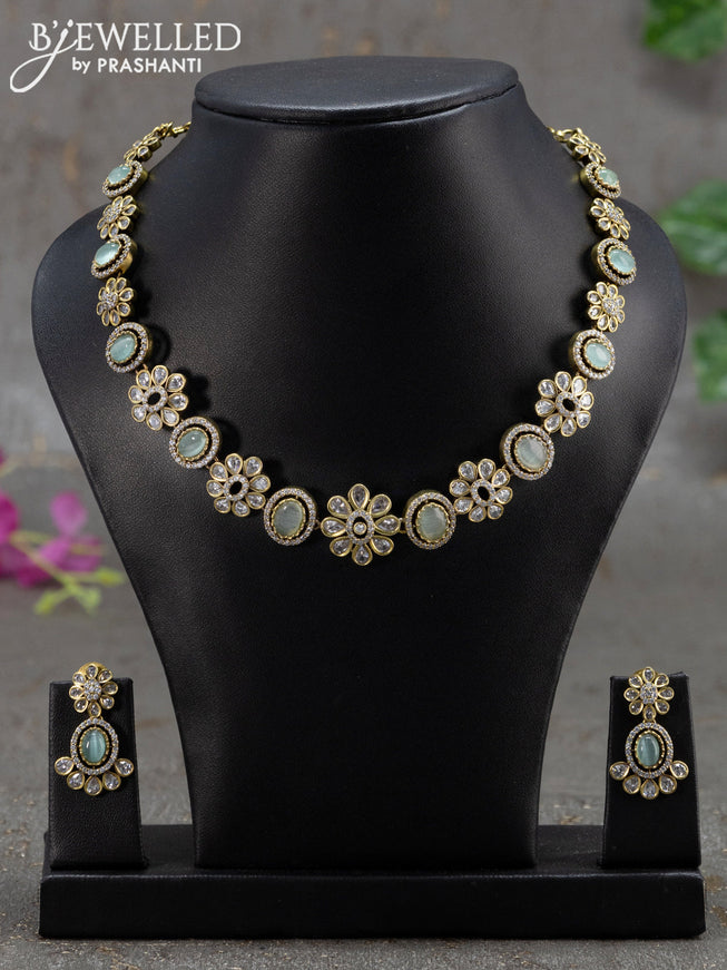 Necklace floral design with mint green and cz stones in victorian finish