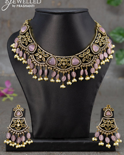 Necklace with baby pink & cz stones and beads hanging in victorian finish
