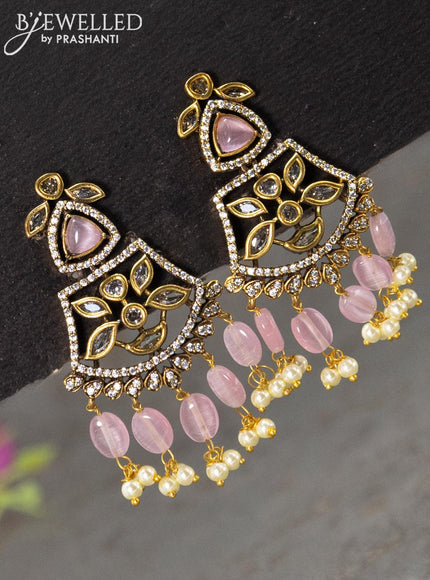 Necklace with baby pink & cz stones and beads hanging in victorian finish