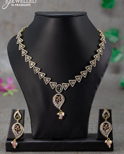 Necklace with kemp & cz stones and beads hanging in victorian finish