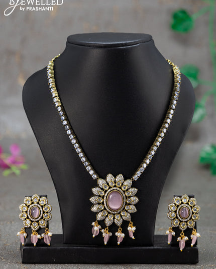 Necklace with baby pink & cz stones and pink beads hanging in victorian finish
