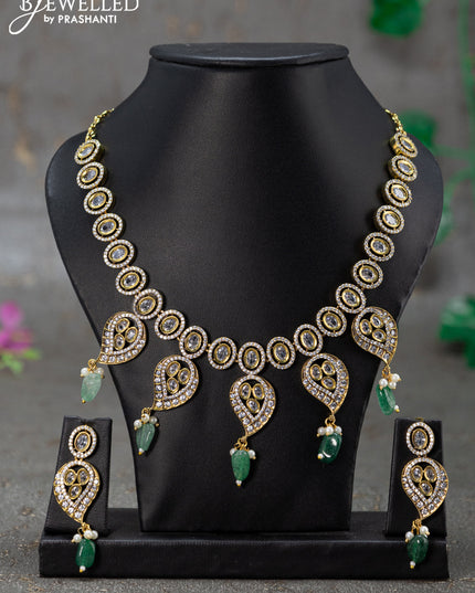 Necklace  with manga pattan & cz stones and green beads hanging in victorian finish