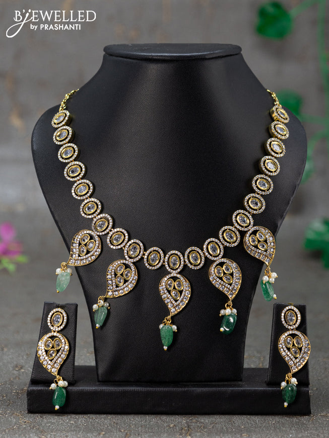 Necklace  with manga pattan & cz stones and green beads hanging in victorian finish