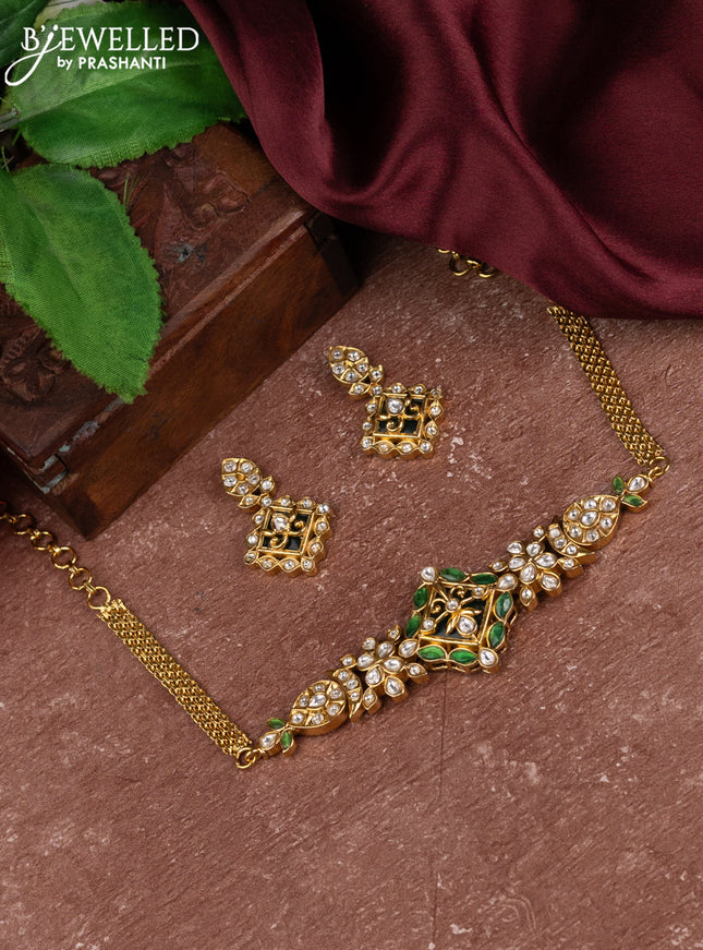 Antique choker with green kemp and kundan stones