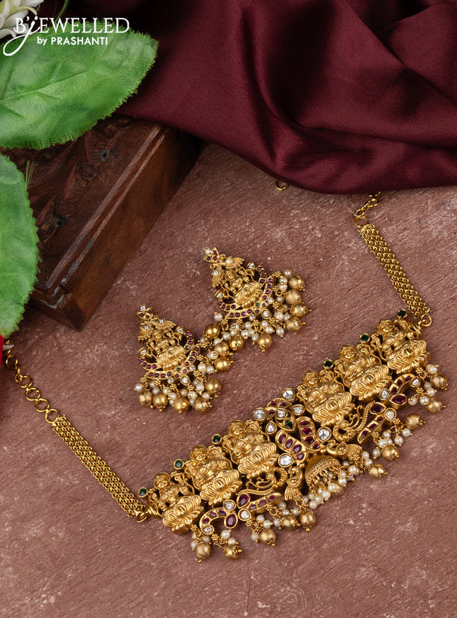 Antique choker with lakshmi design kemp & kundan stones and pearl & golden beads hangings