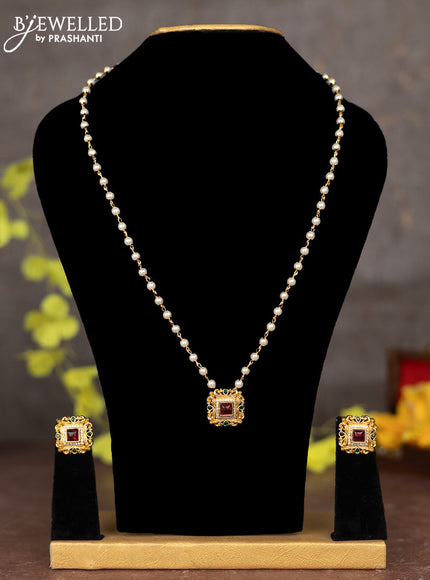 Pearl necklace with kemp and cz stones