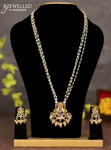 Pearl necklace ganesha pendant with ruby & cz stones and pearl & golden beads hangings