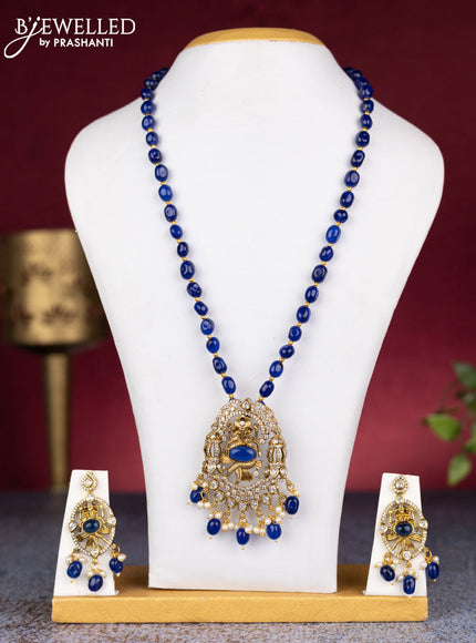 Beaded blue necklace ganesha pendant with sapphire & cz stones and pearl & beads hangings in victorian finish