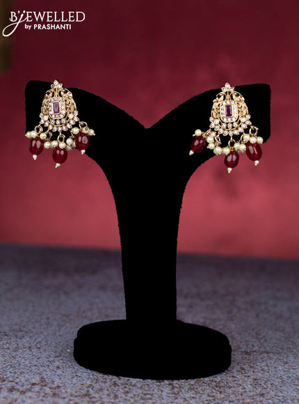 Beaded maroon necklace peacock design with ruby & cz stones and pearl & beads hangings in victorian finish