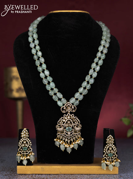 Beaded double layer mint green necklace peacock design with cz stones and beads hangings in victorian finish
