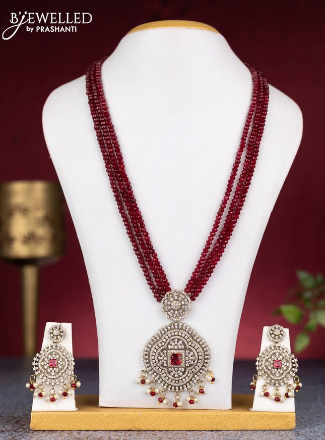Beaded triple layer maroon necklace with ruby & cz stones and pearl & beads hangings in victorian finish