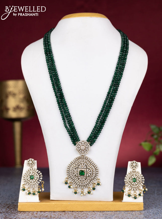 Beaded triple layer green necklace with emerald & cz stones and pearl & beads hangings in victorian finish