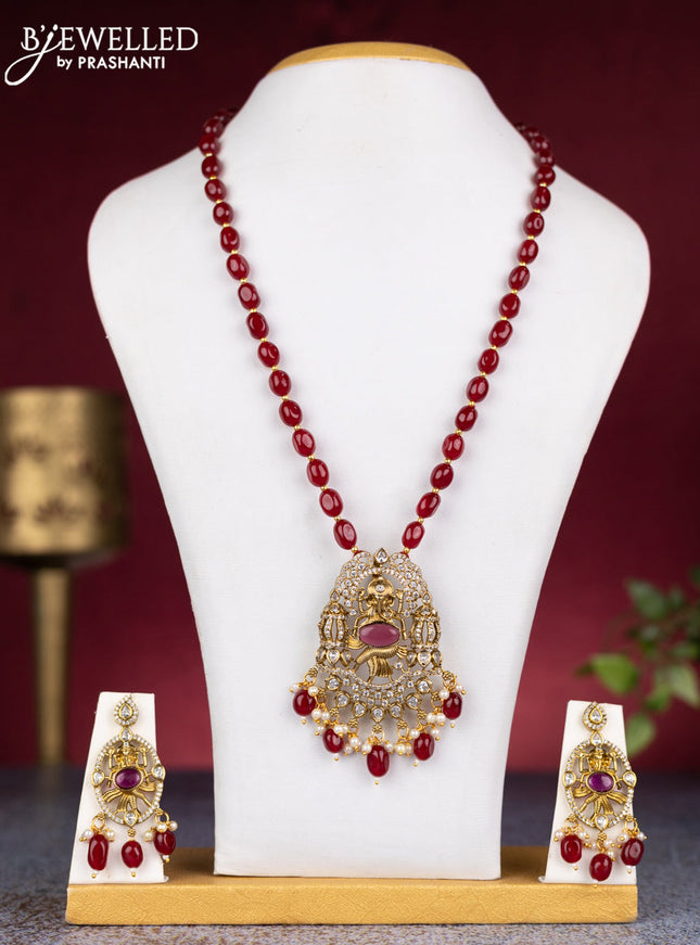 Beaded maroon necklace ganesha pendant with ruby & cz stones and pearl & beads hangings in victorian finish
