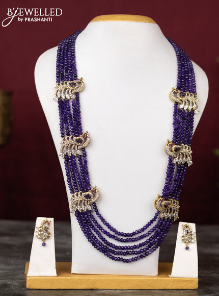 Beaded multilayer violet necklace with peacock side pendant and cz stones in victorian finish