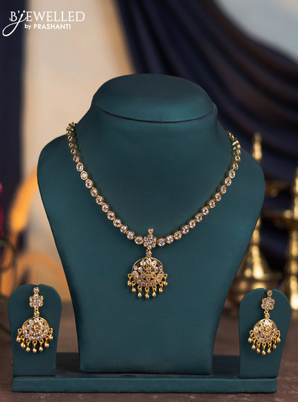 Attigai necklace with cz stones and golden beads hangings in gold finish