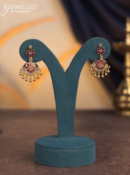 Attigai necklace with ruby & cz stones and golden beads hangings in gold finish