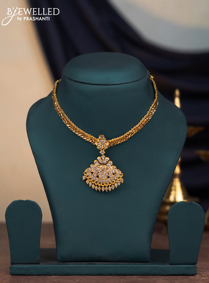Attigai necklace with cz stones and hangings without earrings in gold finish