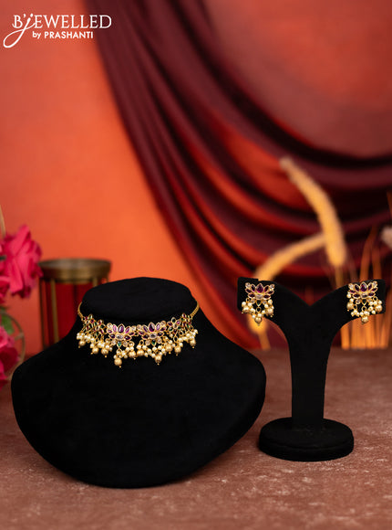 Antique choker lotus design with kemp & cz stones and pearl & golden beads hangings
