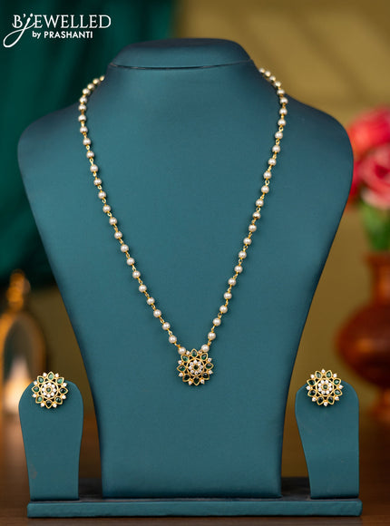 Pearl necklace with emerald and cz stones