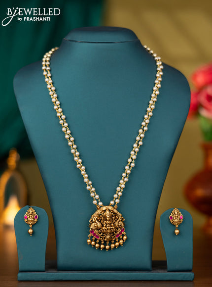 Pearl double layer necklace lakshmi pendant with pink jadau stones and golden beads hangings