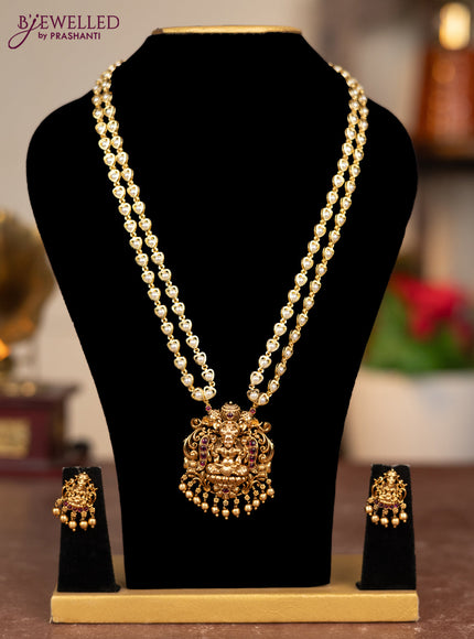 Pearl double layer haram lakshmi pendant with ruby stones and golden beads hangings