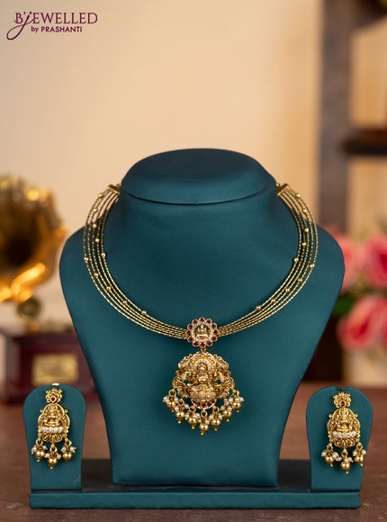 Antique ring type choker lakshmi pendant with kemp & cz stones and pearl & golden beads hangings