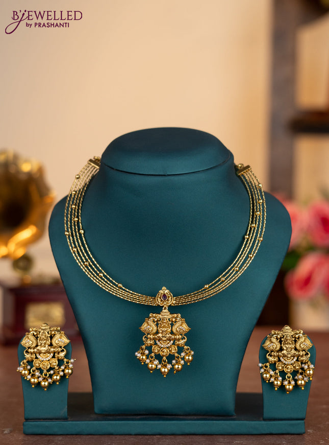 Antique ring type choker lakshmi pendant with ruby & cz stones and pearl & golden beads hangings