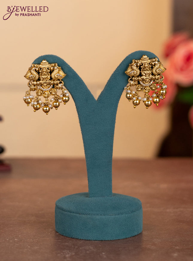 Antique ring type choker lakshmi pendant with ruby & cz stones and pearl & golden beads hangings