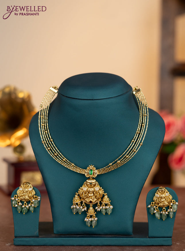 Antique ring type choker lakshmi pendant with ruby & cz stones and pearl & mint green beads hangings