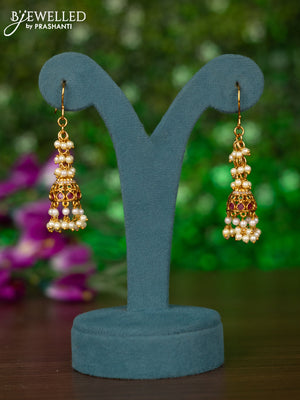 Antique hanging type jhumka with kemp & cz stones and pearl hangings