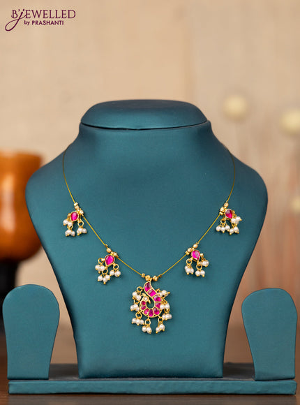 Invisible chain peacock design with pink jadau stones and pearl hangings without earrings