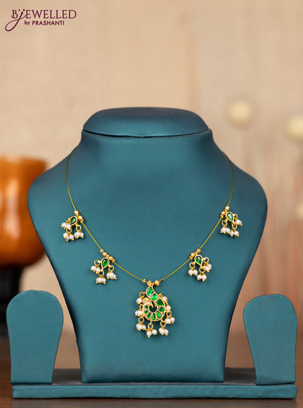 Invisible chain peacock design with green jadau stones and pearl hangings without earrings